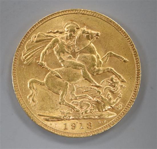 A 1913 gold full sovereign.